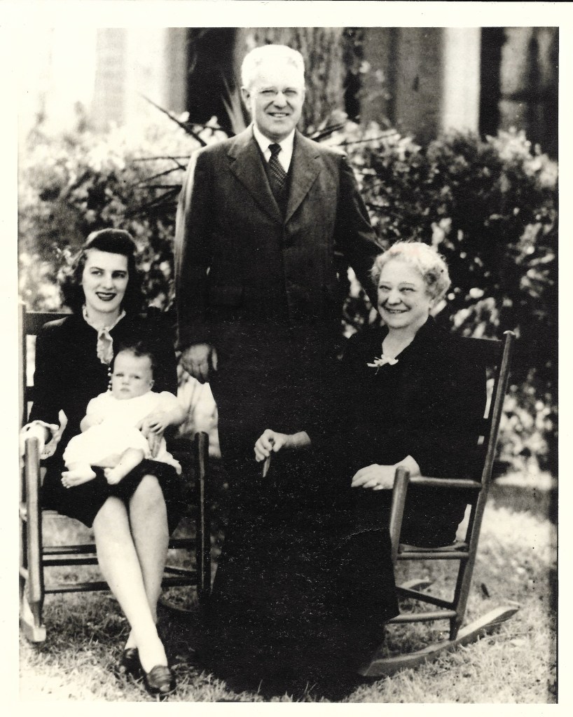 Cornelia Broadfoot holding Thomas Winston Broadfoot, William Gillies Broadfoot standing, Sarah Frances Bryan Broadfoot seated 1944